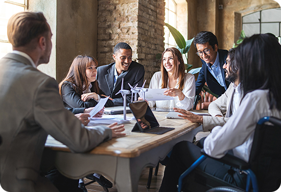 A group of diverse colleagues sitting around a conference table